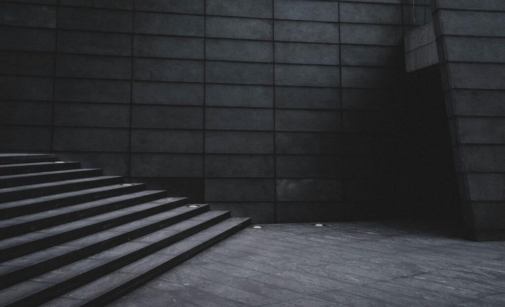 building, stairs, wall, gray building, gray wall, stairs, stairs, stairs, stairs, stairs, wall, wall, wall, gray building, gray building